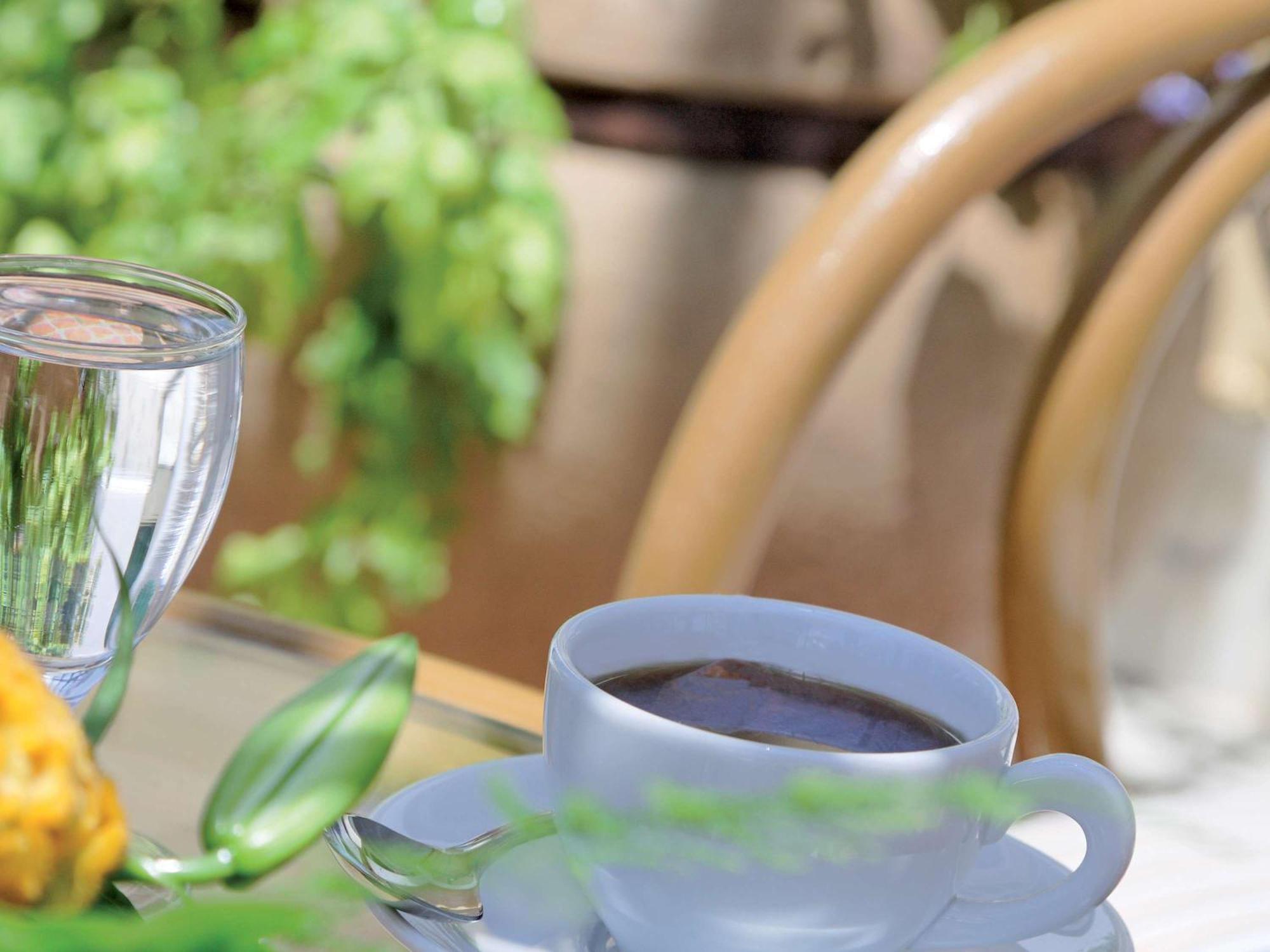Moevenpick Hotel Cairo - Media City Giza Exterior photo A cup of coffee